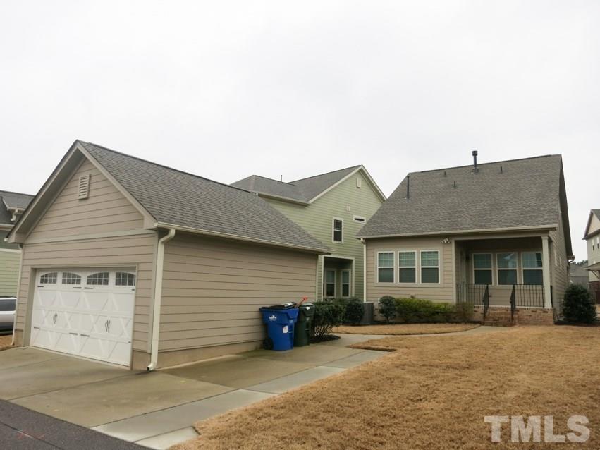 1556 Rodessa Run Raleigh, NC 27607 - Photo 22 of 25 2-car garage + extra parking pad off rear alley.