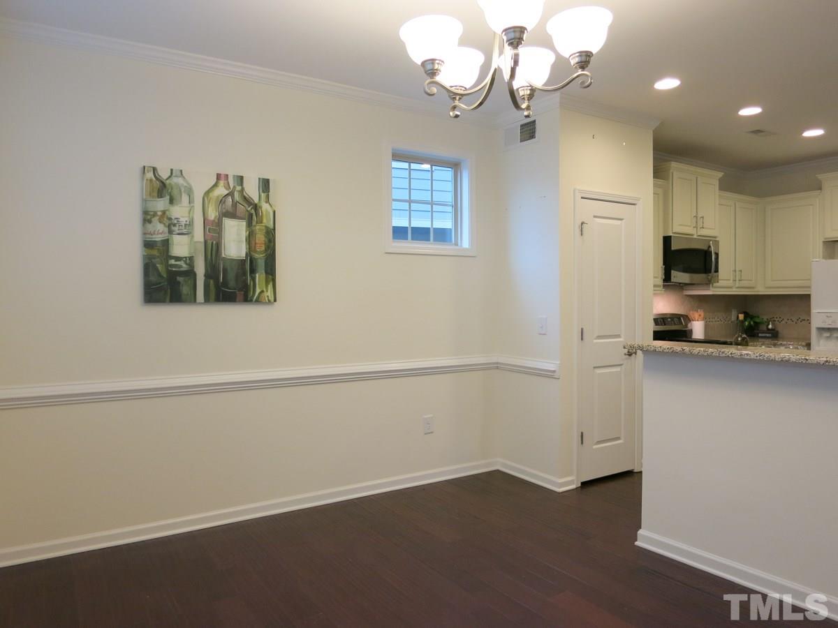 1556 Rodessa Run Raleigh, NC 27607 - Photo 7 of 25 Another view of the sunny Dining Area which is open to the Kitchen.