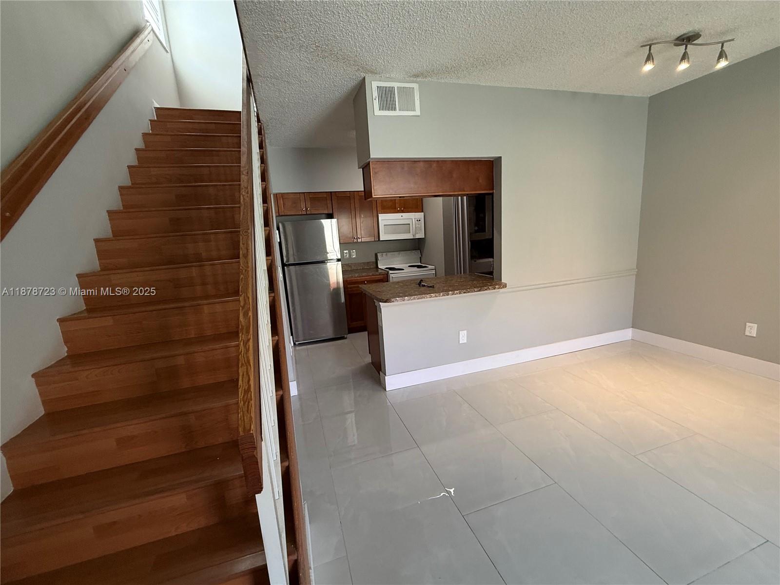 18332 Northwest 68th Avenue, Unit A Hialeah, FL 33015 - Photo 4 of 25