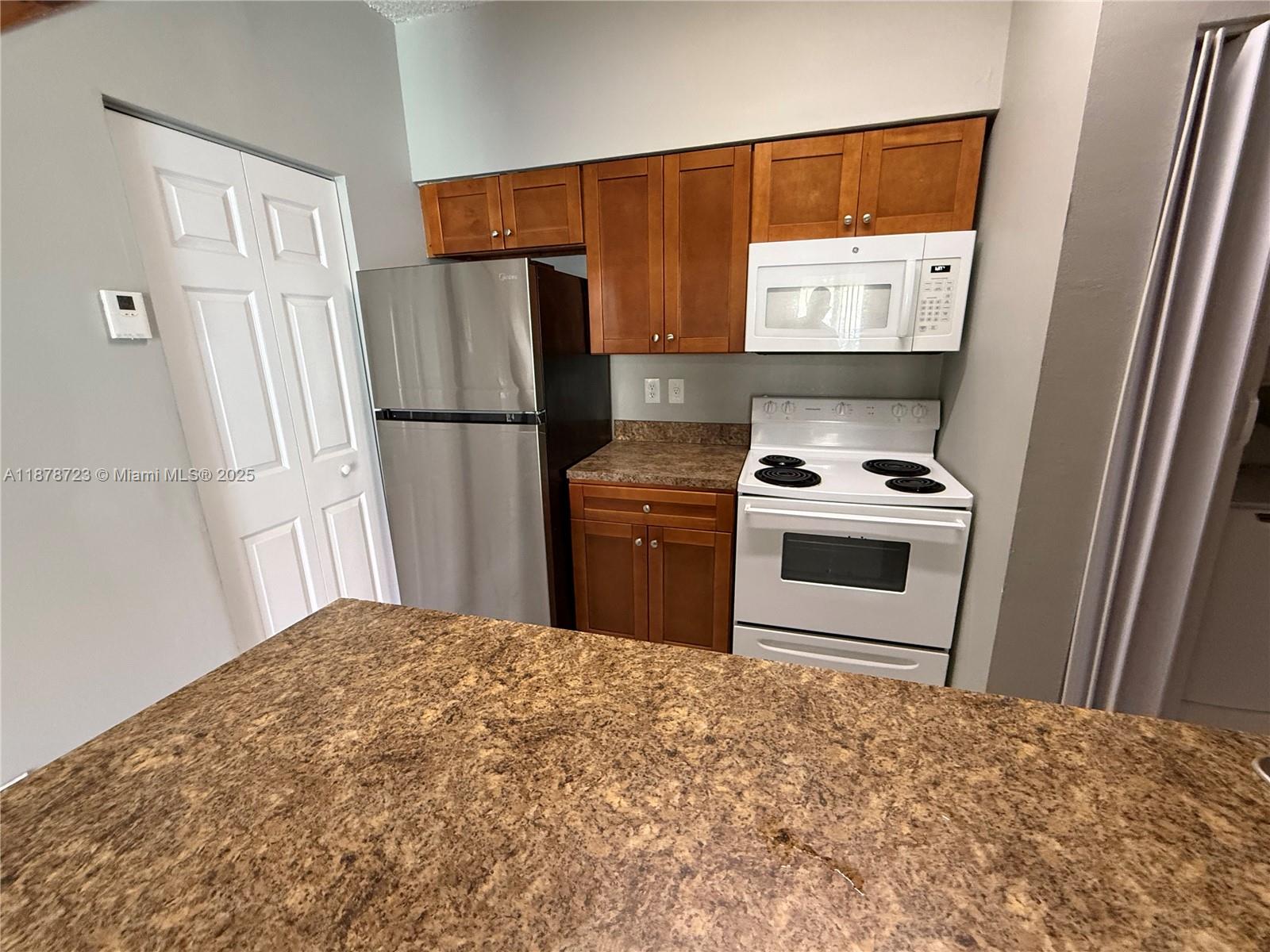 18332 Northwest 68th Avenue, Unit A Hialeah, FL 33015 - Photo 7 of 25