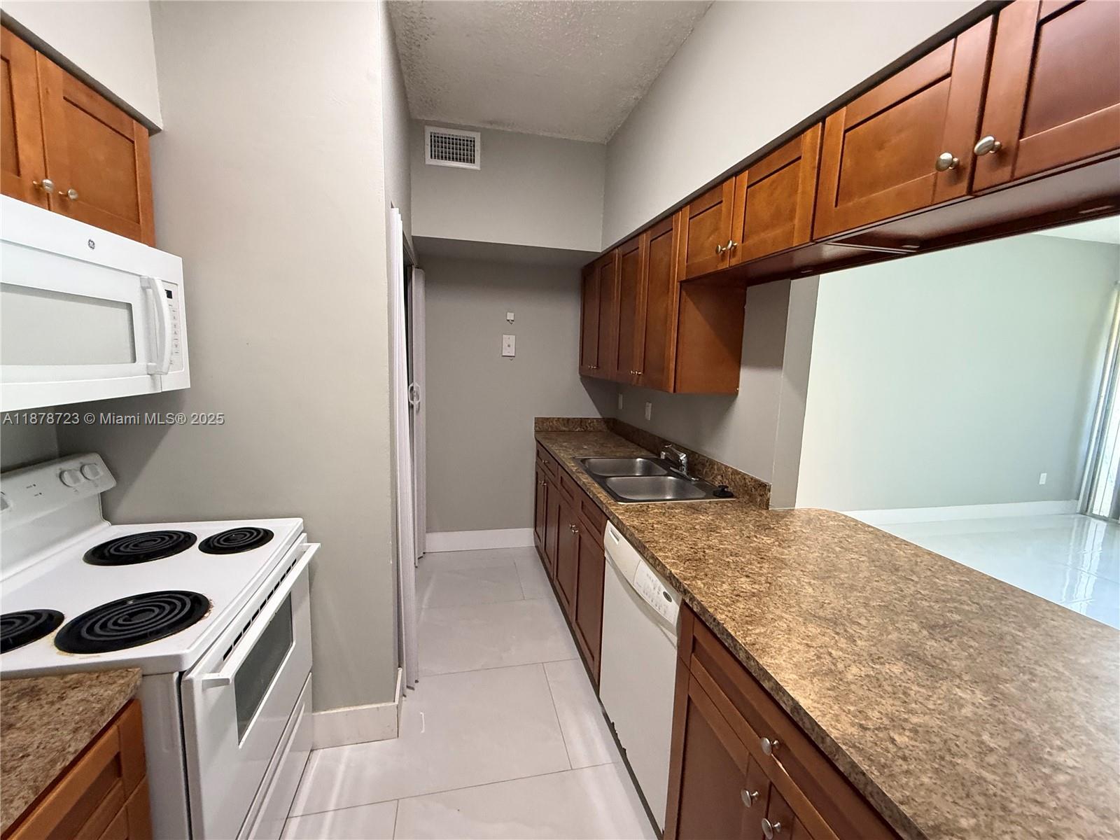 18332 Northwest 68th Avenue, Unit A Hialeah, FL 33015 - Photo 9 of 25
