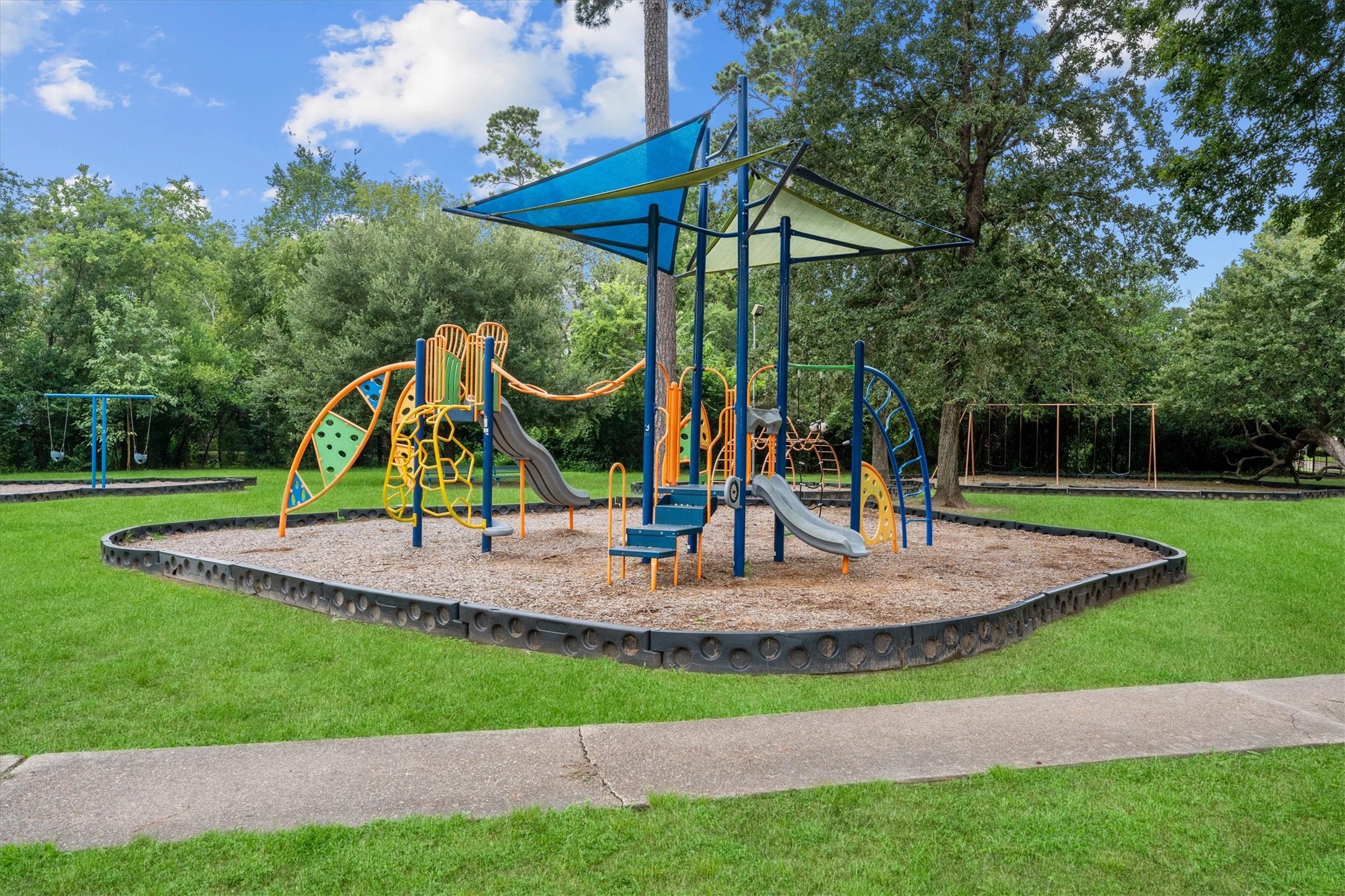 17319 Cypress Spring Drive Spring, TX 77388 - Photo 45 of 50 A playground with many options for littles to explore.