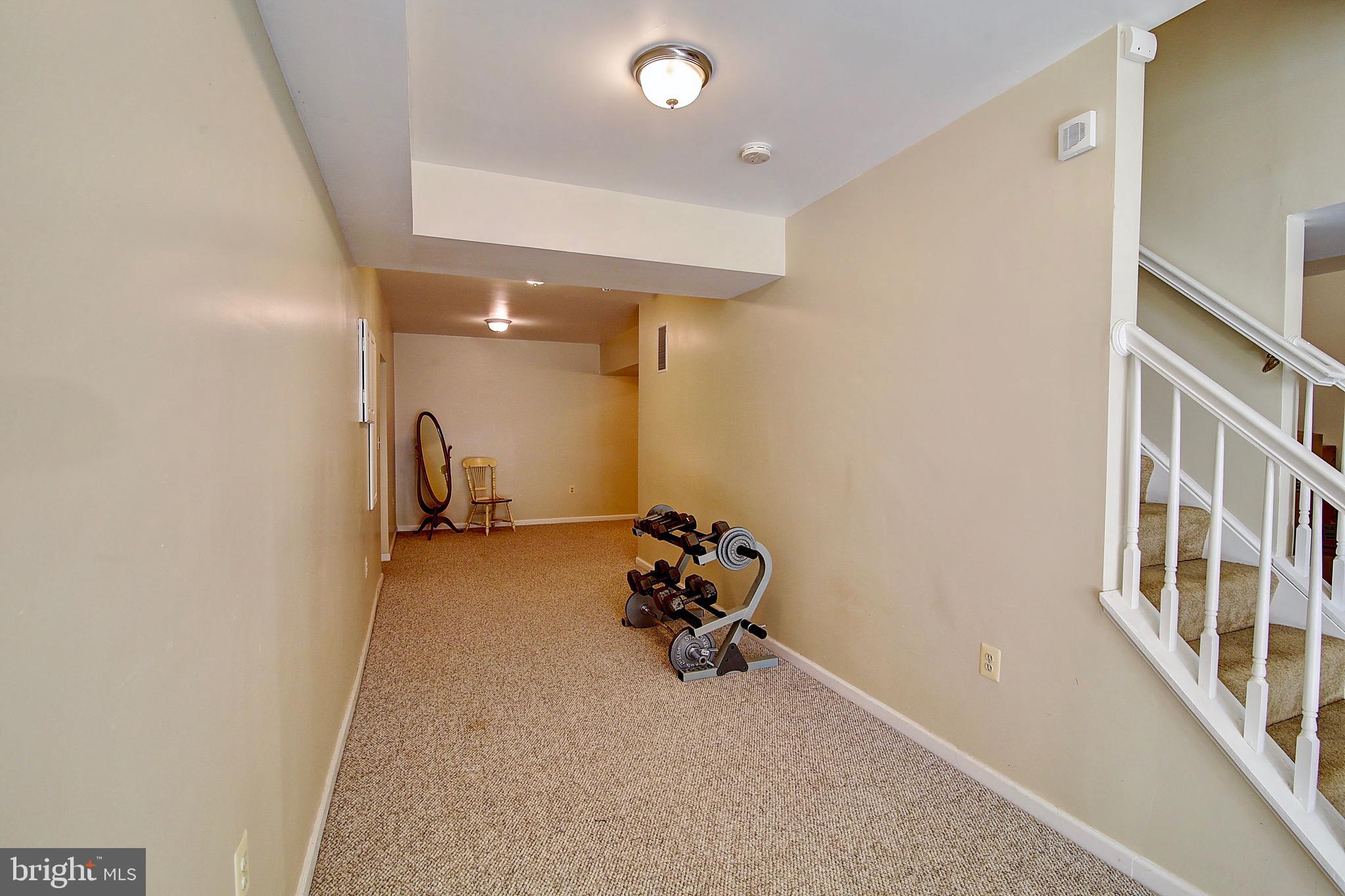 19169 Silcott Springs Road Purcellville, VA 20132 - Photo 44 of 70 Lower Level Exercise Area