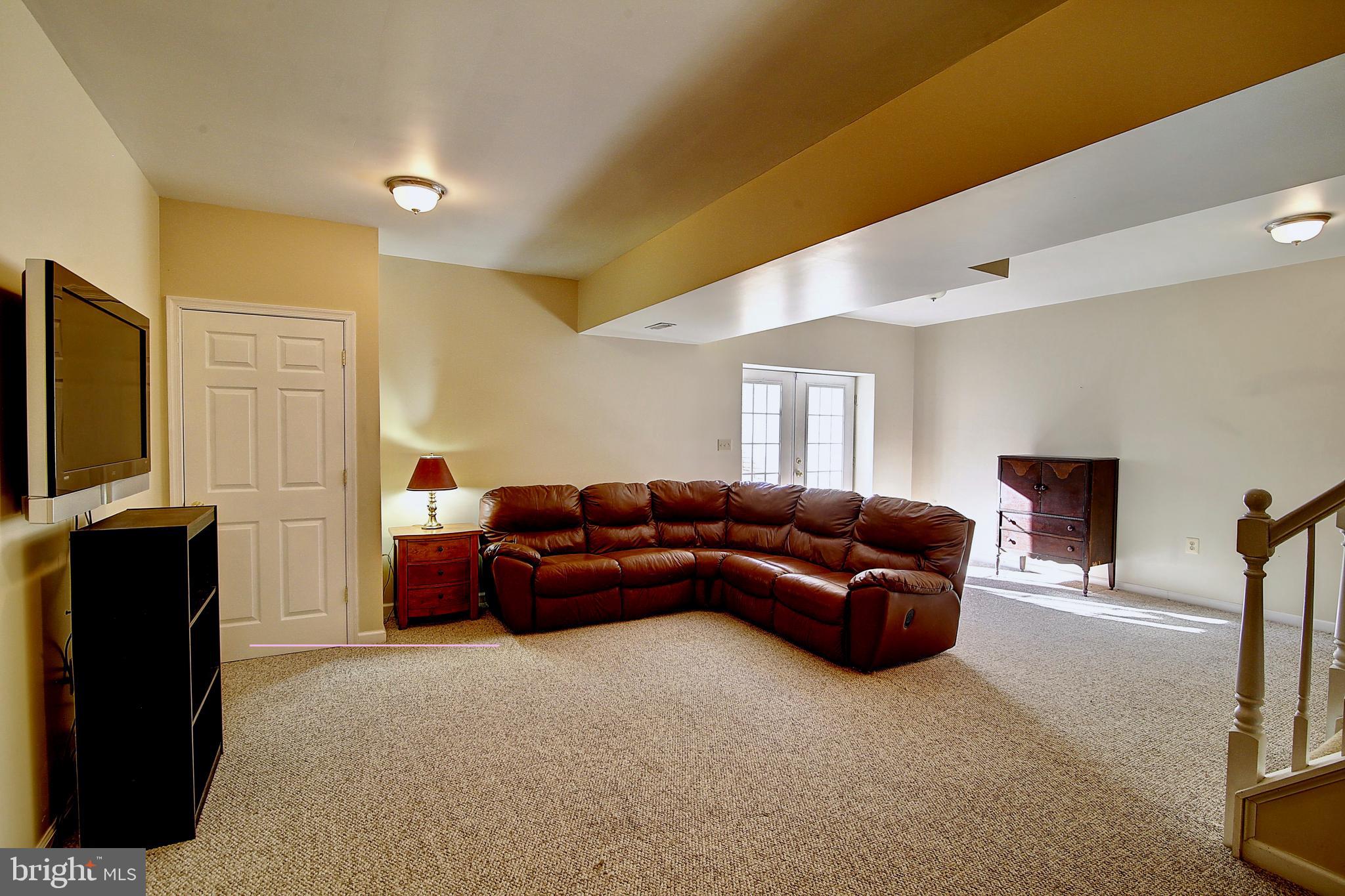 19169 Silcott Springs Road Purcellville, VA 20132 - Photo 46 of 70 Lower Level Family Room w/ Walk Up