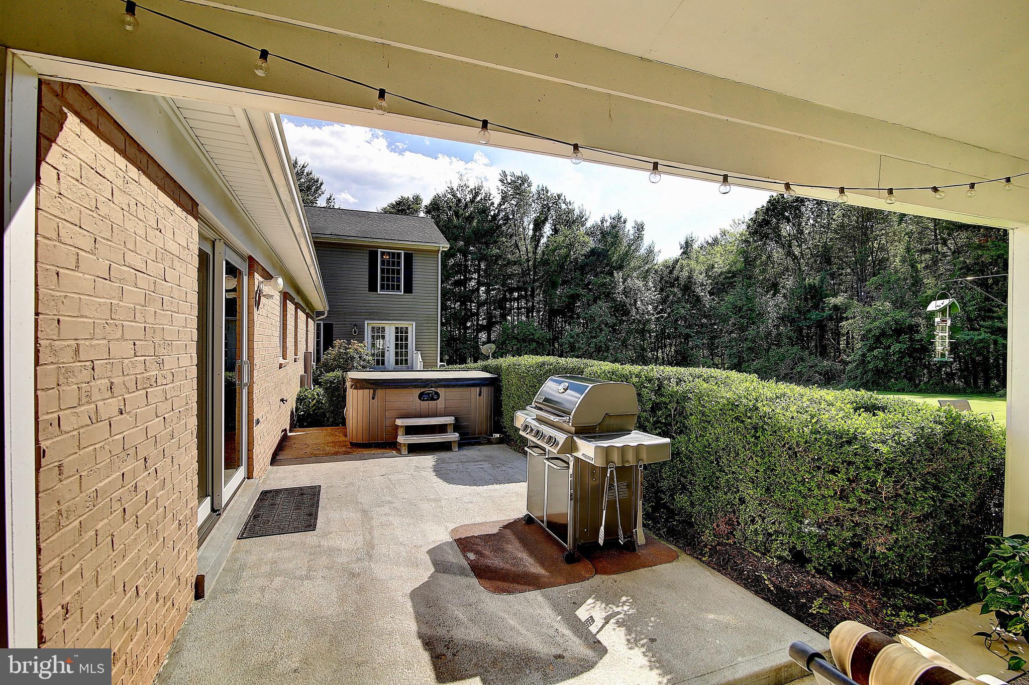 19169 Silcott Springs Road Purcellville, VA 20132 - Photo 49 of 70 Patio w/ Hot Tub