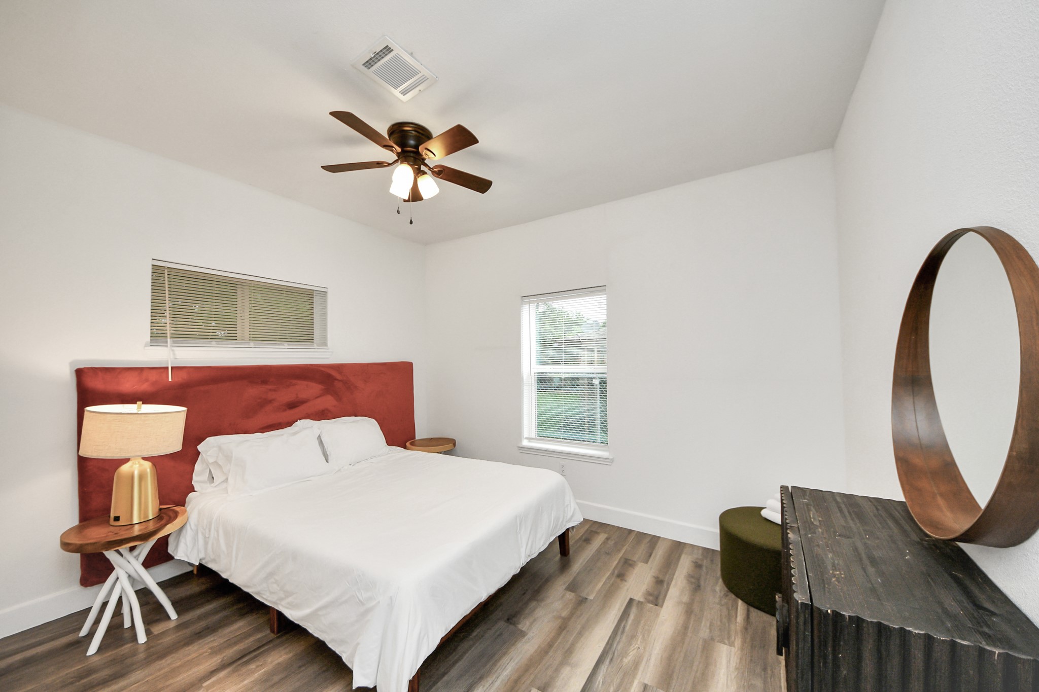 6917 Rook Boulevard Houston, TX 77087 - Photo 20 of 32 a bedroom with a bed a dresser and chair