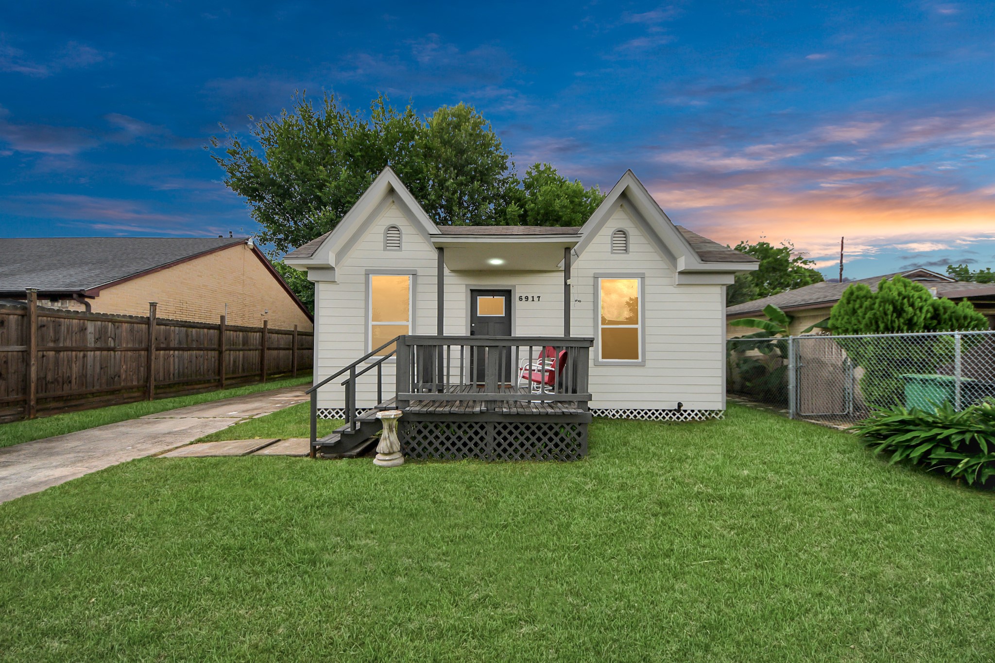 6917 Rook Boulevard Houston, TX 77087 - Photo 2 of 32 a front view of a house with a yard
