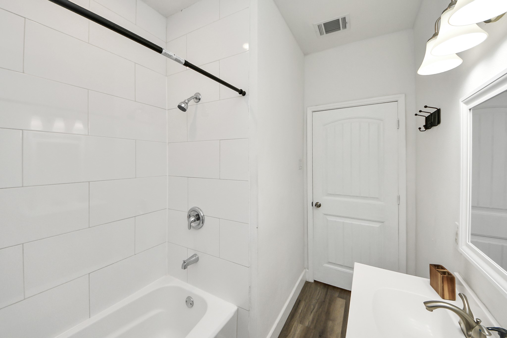 6917 Rook Boulevard Houston, TX 77087 - Photo 29 of 32 a bathroom with a bathtub and shower
