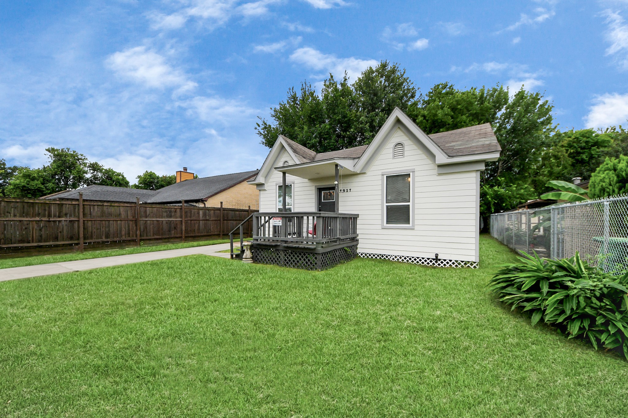 6917 Rook Boulevard Houston, TX 77087 - Photo 3 of 32 a view of a house with a yard and sitting area