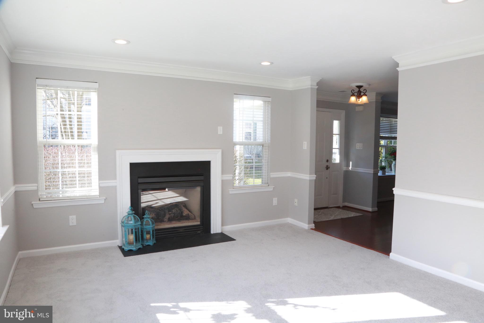 226 Flagstone Road, Unit 4 Chester Springs, PA 19425 - Photo 6 of 28 Gas fireplace, fresh paint and crown modings