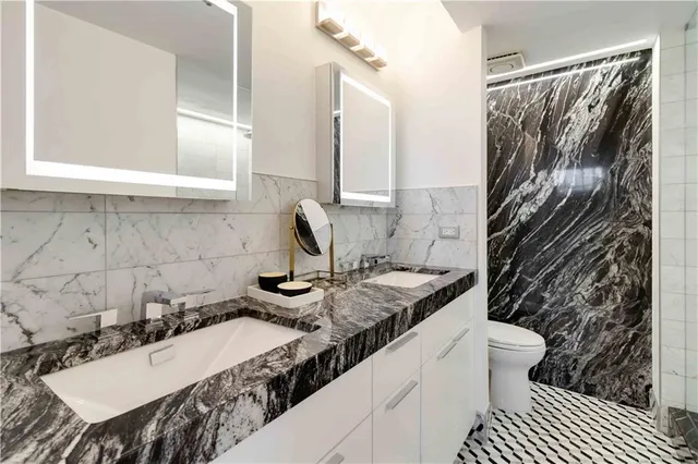 a bathroom with a sink and a toilet