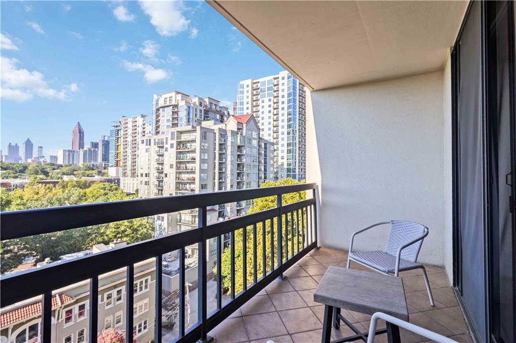 1130 Piedmont Avenue Northeast, Unit 1109 Atlanta, GA 30309 - Photo 23 of 40 a view of a city from a balcony