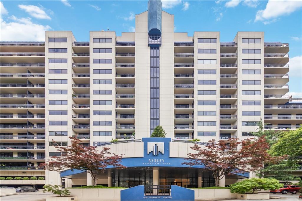 1130 Piedmont Avenue Northeast, Unit 1109 Atlanta, GA 30309 - Photo 28 of 40 a front view of a building with a street