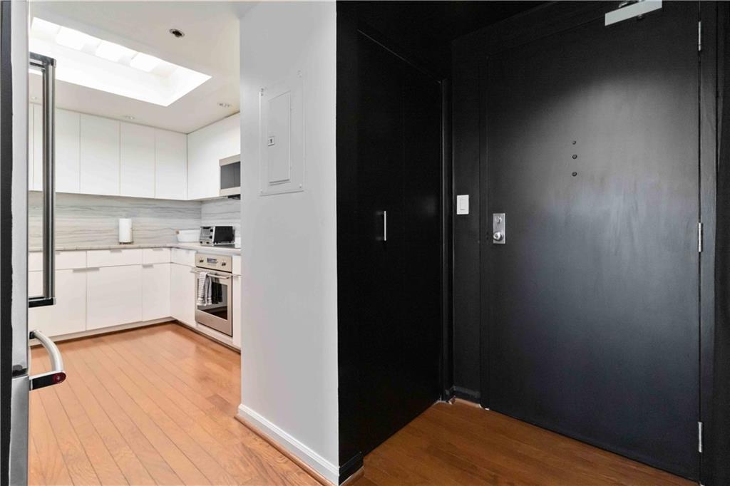1130 Piedmont Avenue Northeast, Unit 1109 Atlanta, GA 30309 - Photo 3 of 40 a view of kitchen with wooden floor