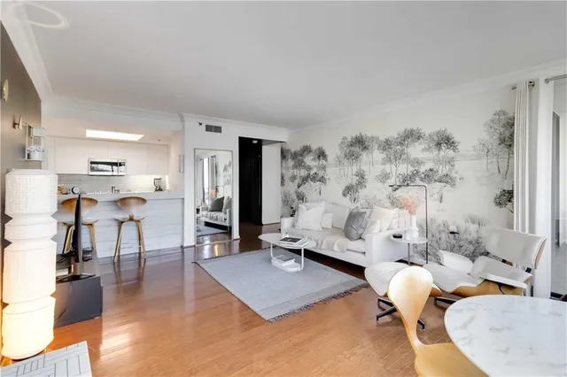 a living room with furniture and a table