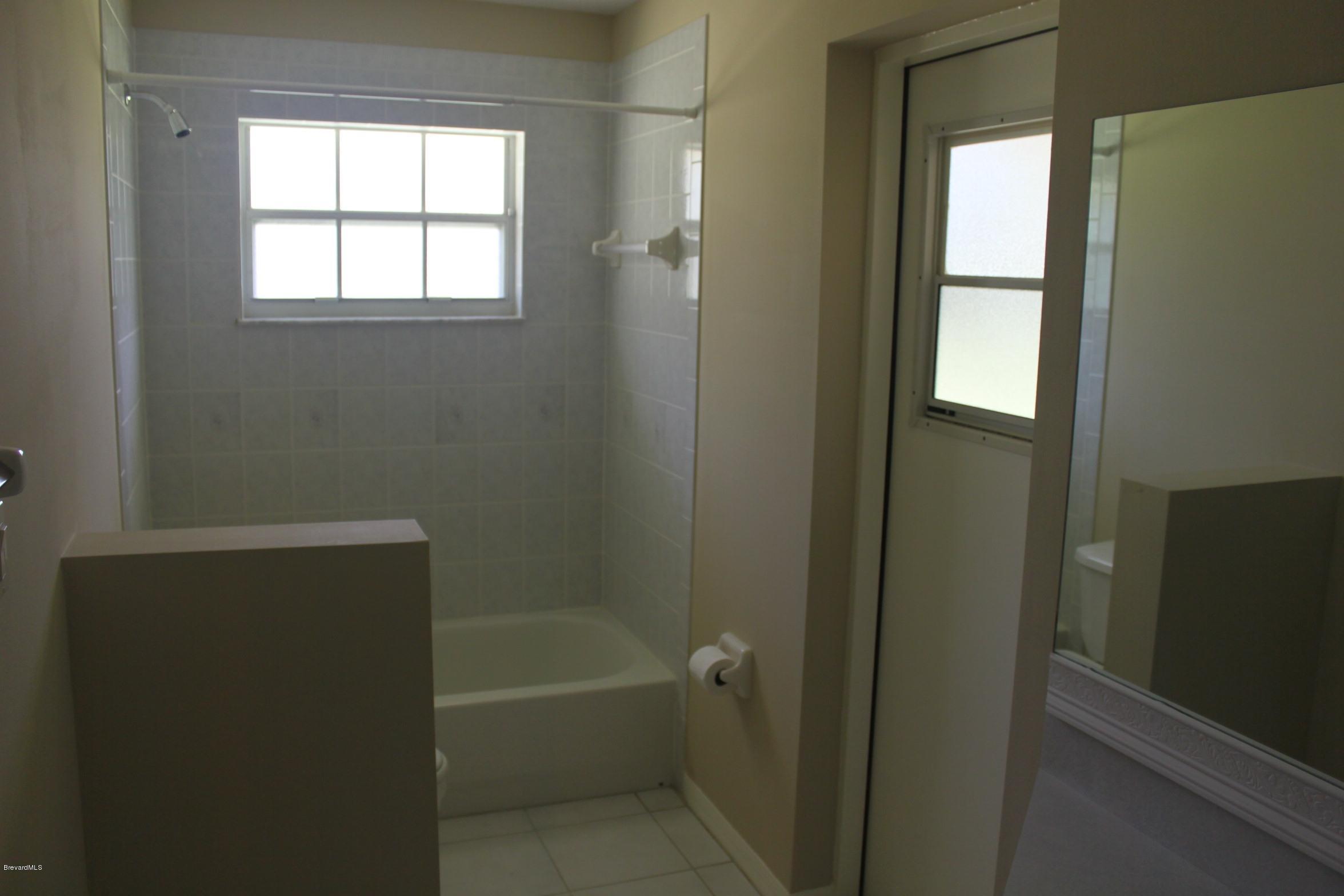 3745 Corey Road Grant Valkaria, FL 32950 - Photo 2 of 14 2nd bathroom