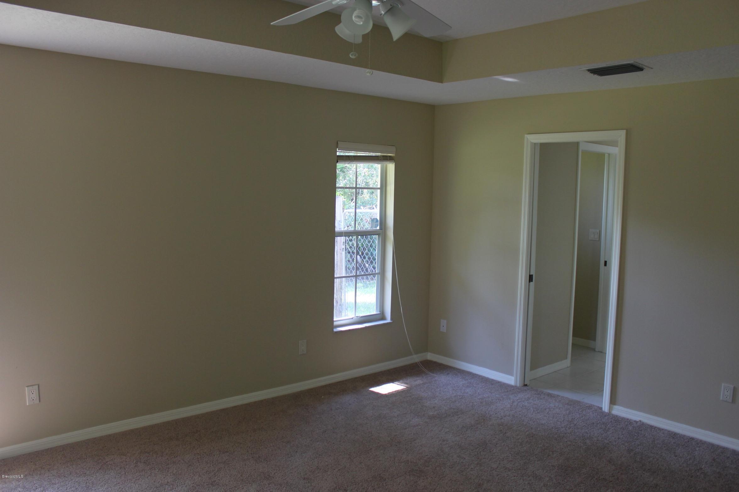 3745 Corey Road Grant Valkaria, FL 32950 - Photo 13 of 14 master bedroom