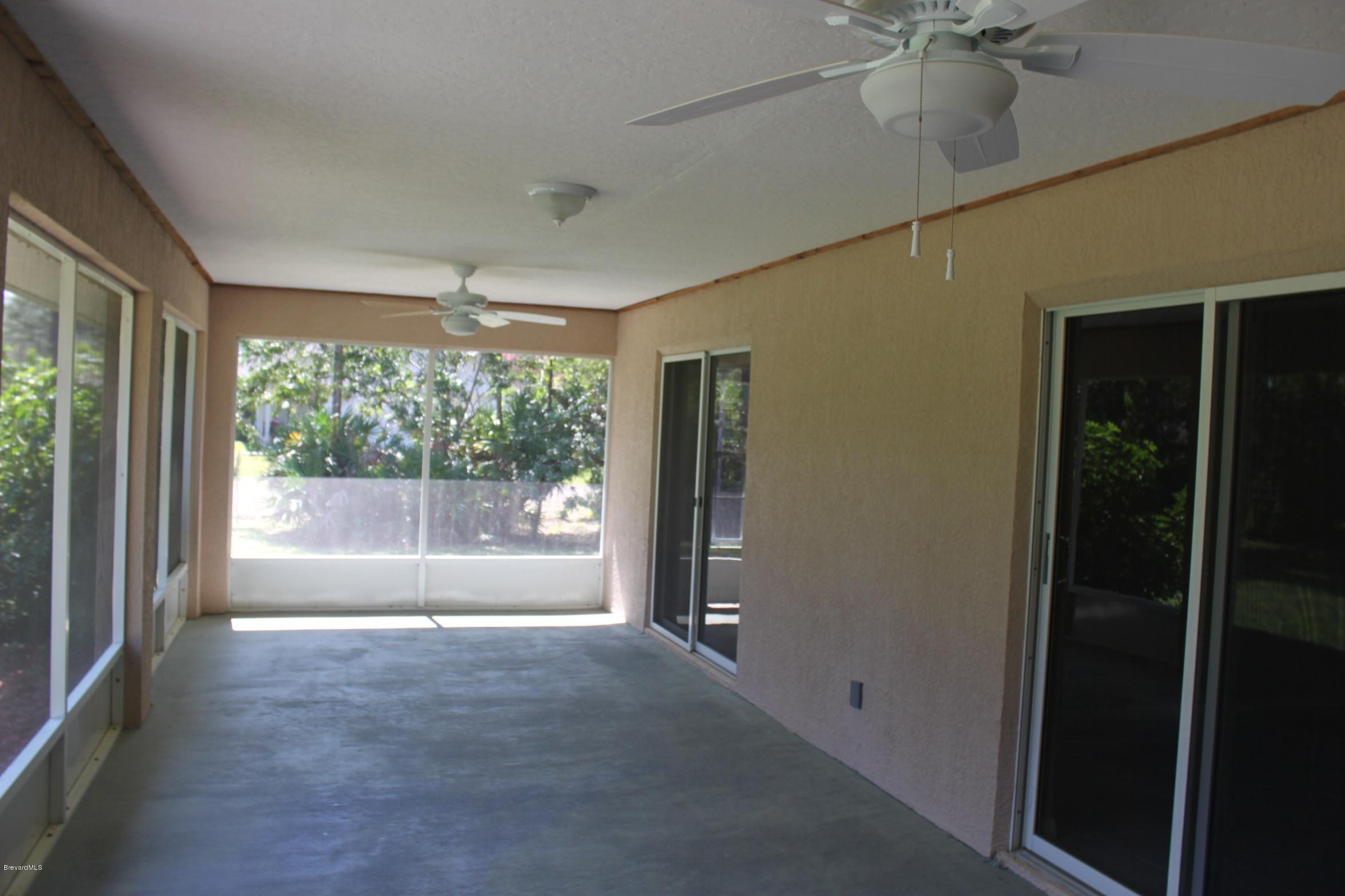 3745 Corey Road Grant Valkaria, FL 32950 - Photo 14 of 14 screened porch