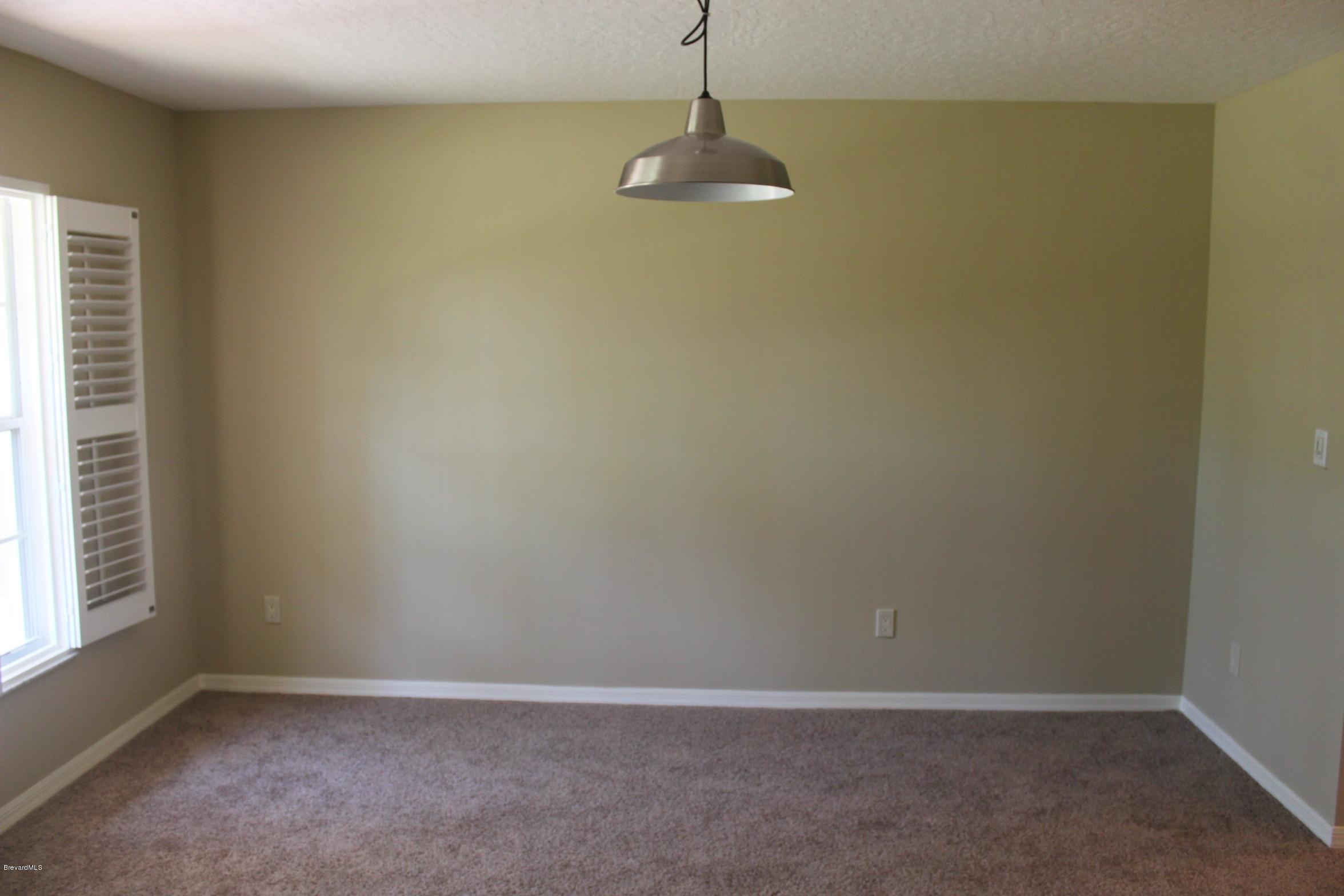 3745 Corey Road Grant Valkaria, FL 32950 - Photo 7 of 14 formal dining
