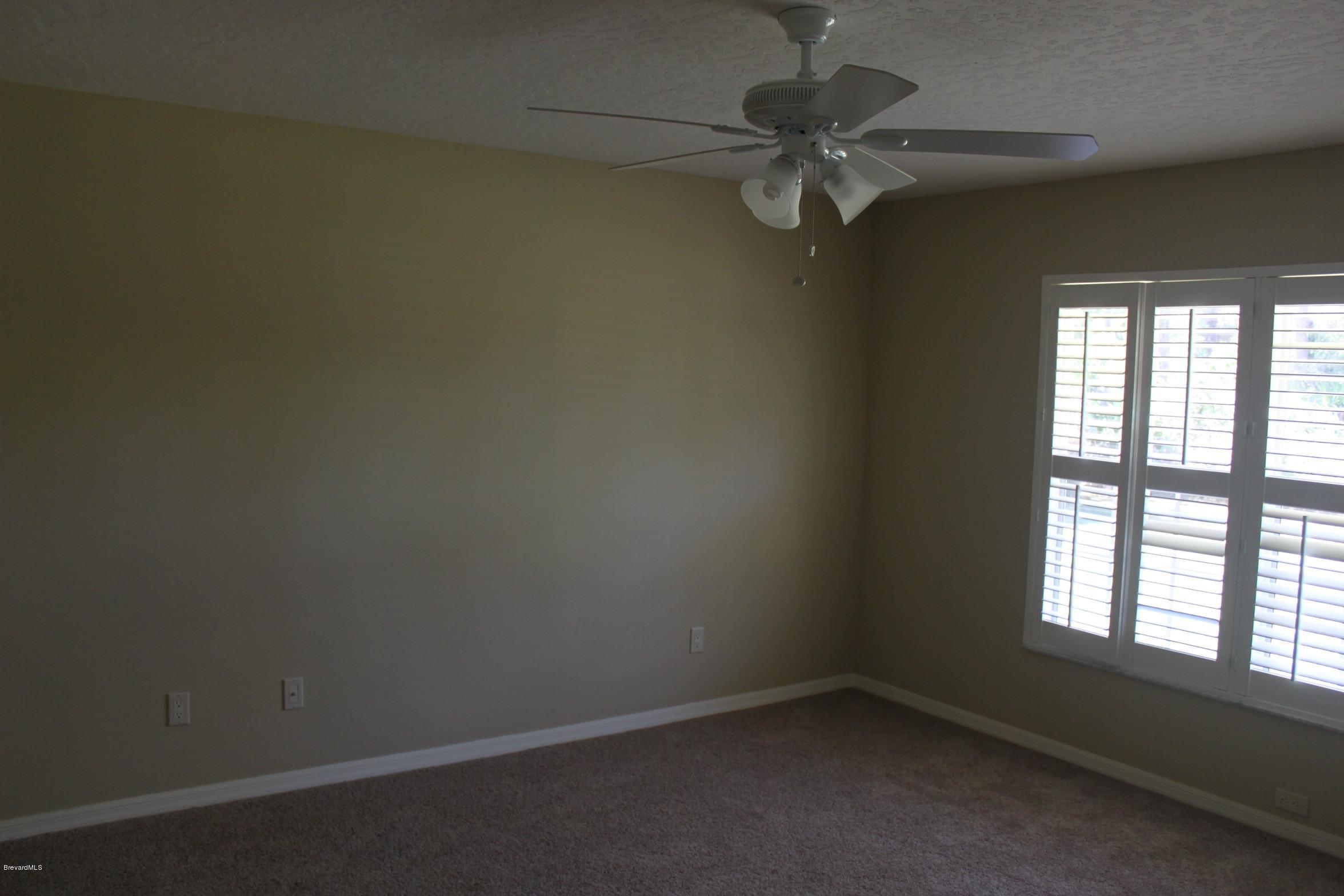 3745 Corey Road Grant Valkaria, FL 32950 - Photo 8 of 14 formal living