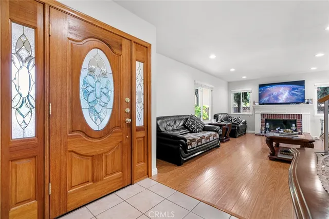 a living room with furniture or couch and a fireplace