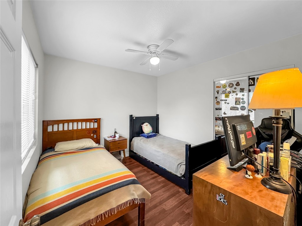 412 West Pear Street Compton, CA 90222 - Photo 15 of 19 a bedroom with two beds and a desk