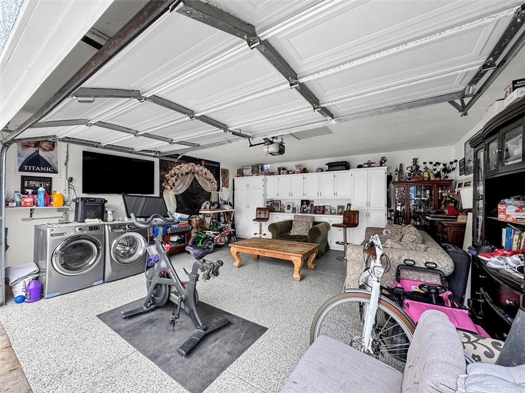 412 West Pear Street Compton, CA 90222 - Photo 16 of 19 a view of a room with lots of stuff and toys