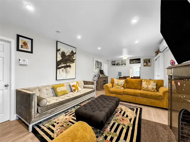 a living room with furniture and a couch