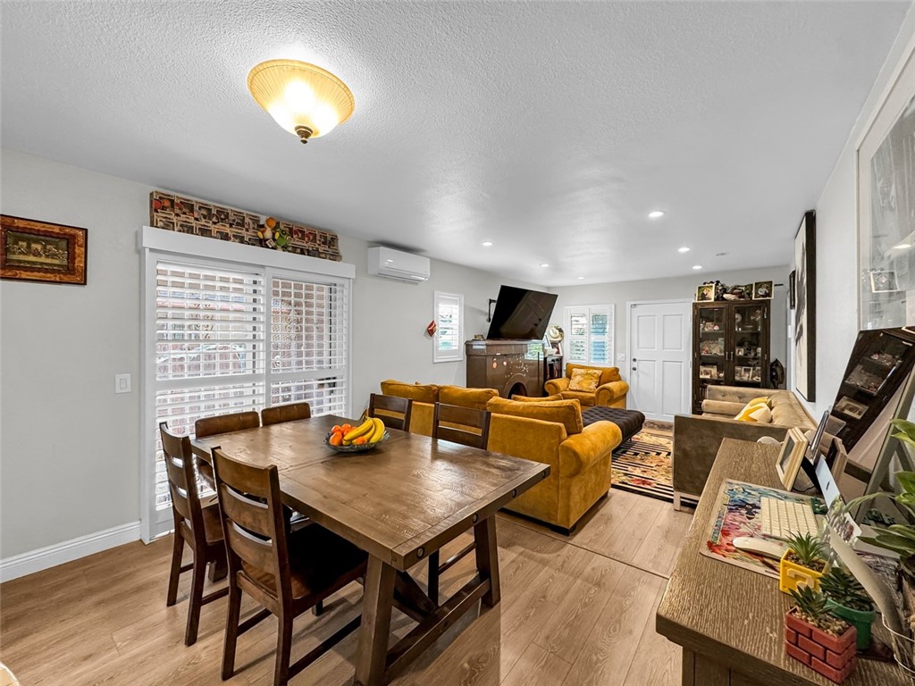 412 West Pear Street Compton, CA 90222 - Photo 9 of 19 a view of a dining room with furniture and a window