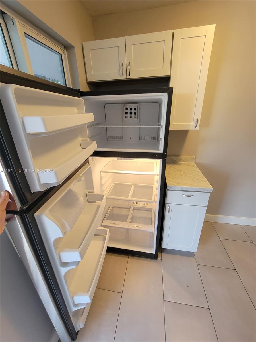 1150 Northwest 1st Place, Unit 2 Miami, FL 33136 - Photo 14 of 19 a view of washer and dryer