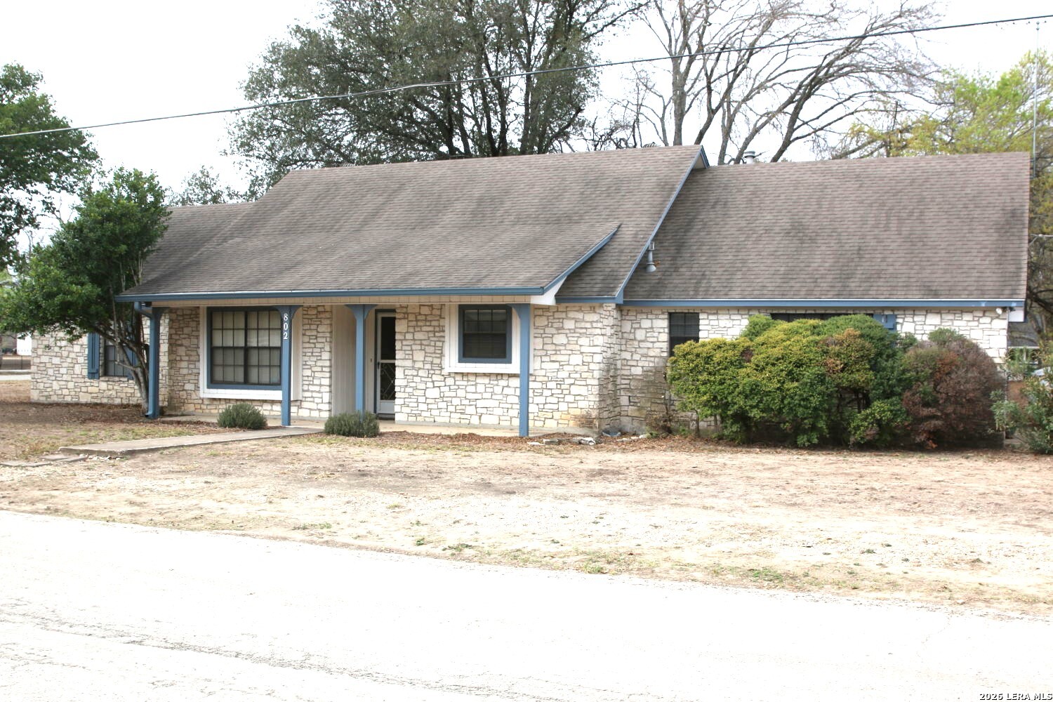 802 Athens Street Castroville, TX 78009 - Photo 1 of 44 a backyard of a house