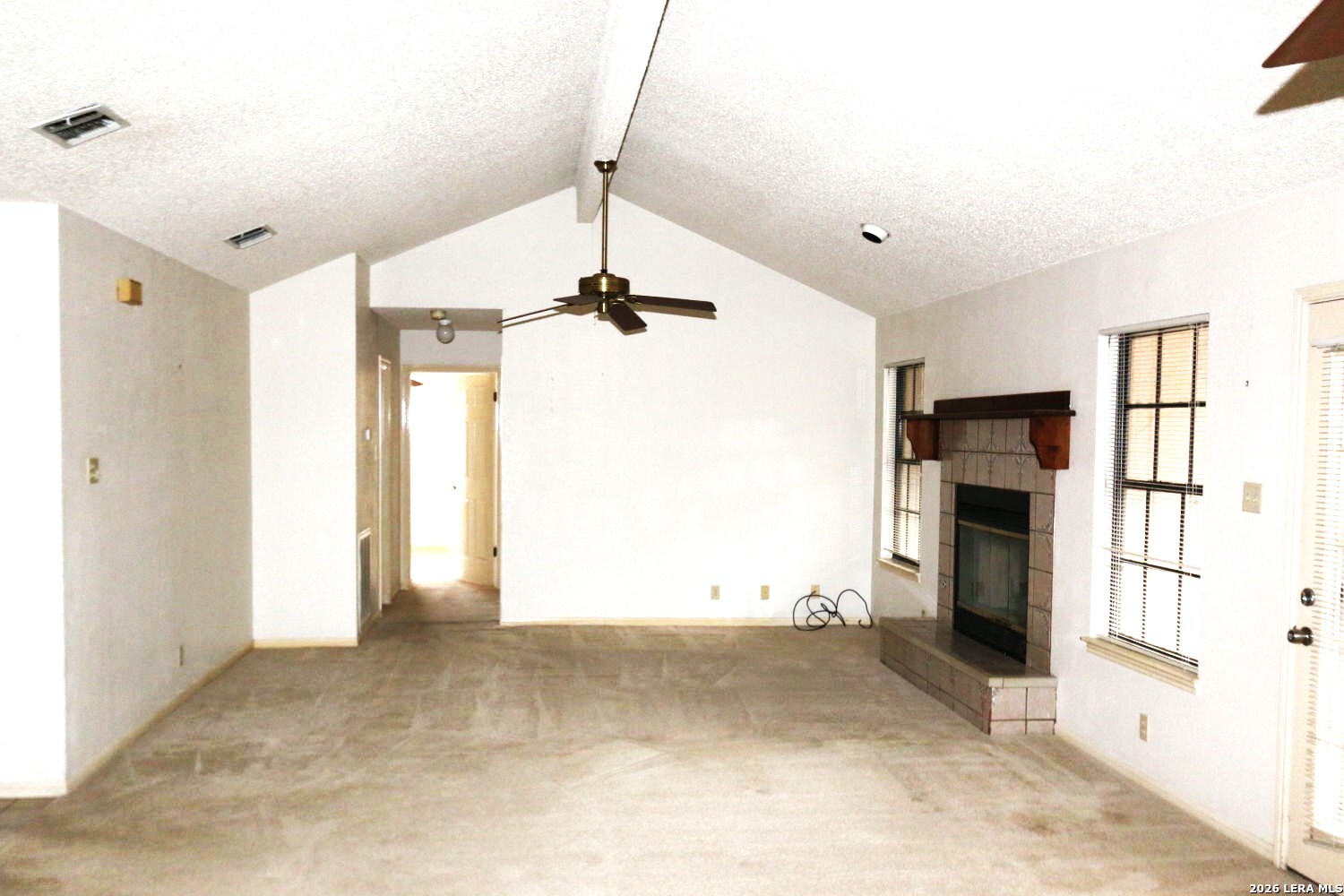 802 Athens Street Castroville, TX 78009 - Photo 14 of 44 a view of a livingroom with a fireplace