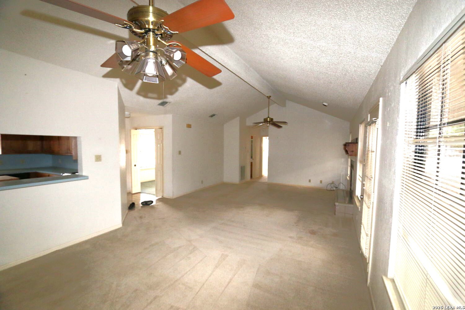 802 Athens Street Castroville, TX 78009 - Photo 15 of 44 a view of a livingroom with a flat screen tv