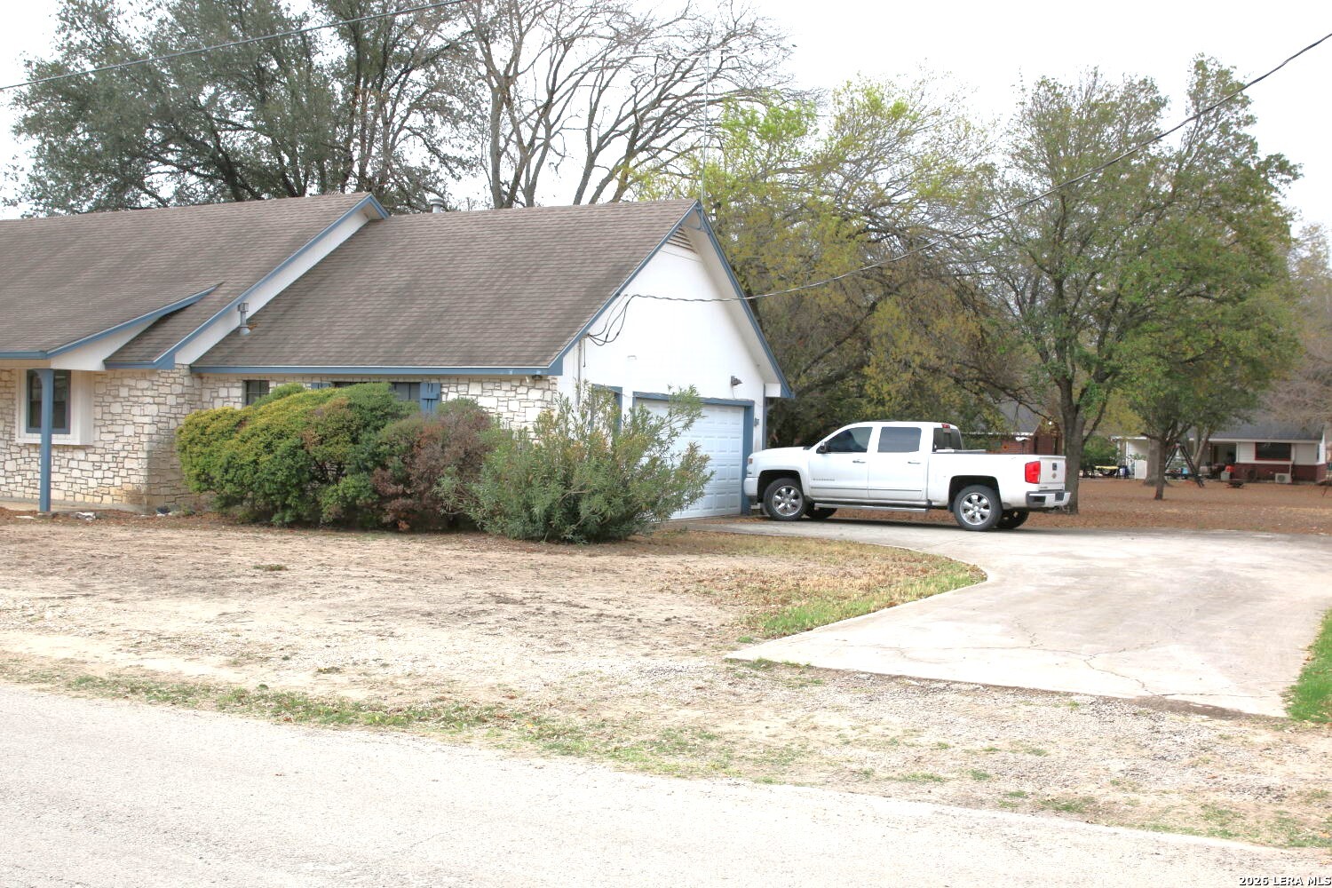 802 Athens Street Castroville, TX 78009 - Photo 2 of 44 a car parked on the side of the road
