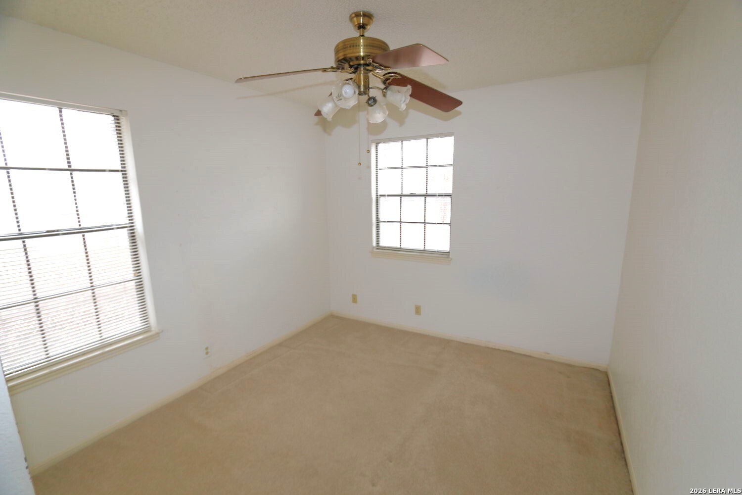 802 Athens Street Castroville, TX 78009 - Photo 25 of 44 an empty room with a window