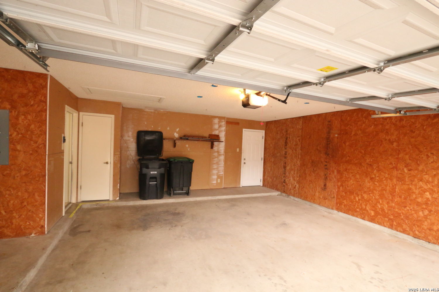 802 Athens Street Castroville, TX 78009 - Photo 36 of 44 a view of a livingroom with a fireplace dryer and chandelier