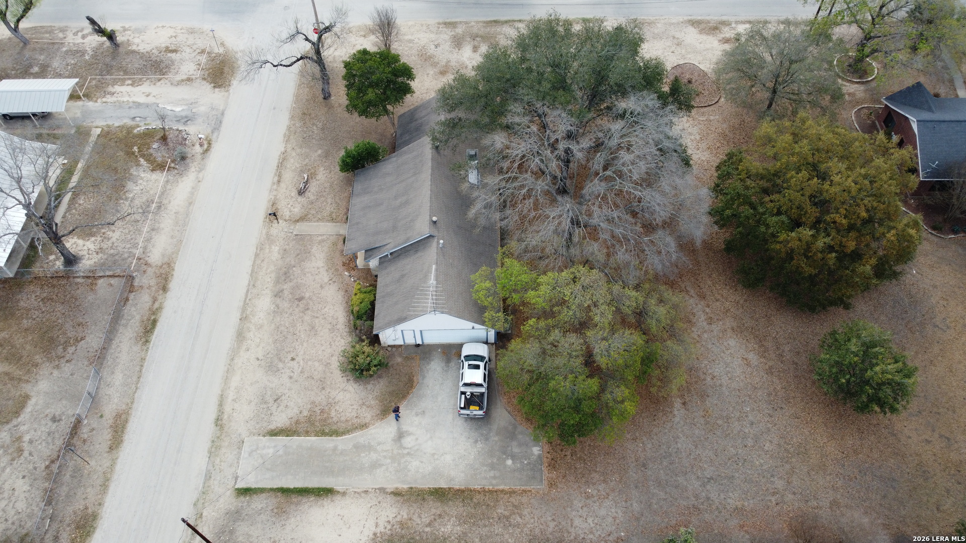 802 Athens Street Castroville, TX 78009 - Photo 39 of 44 a view of a house with a plants and pathway