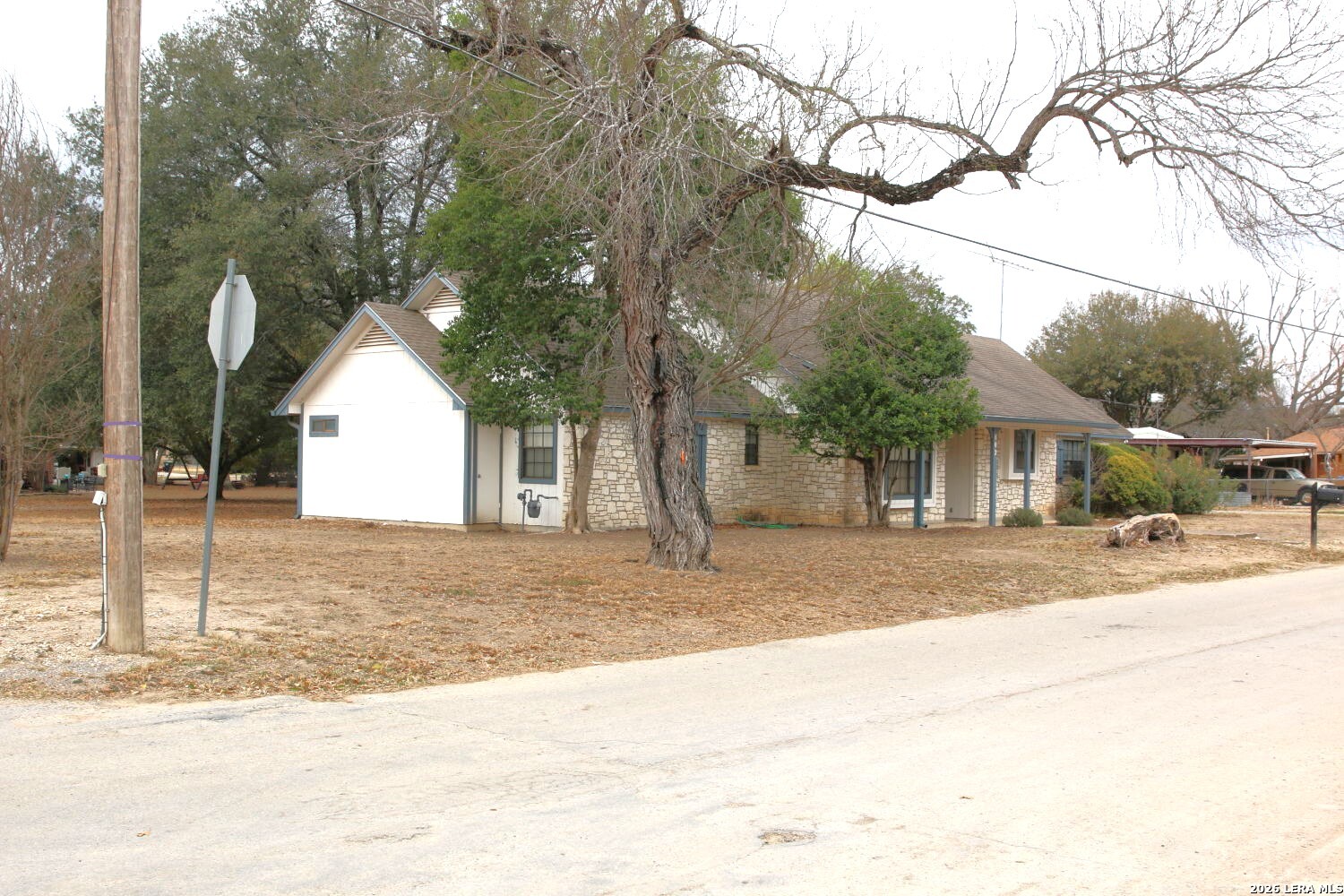 802 Athens Street Castroville, TX 78009 - Photo 43 of 44 a view of a house with a yard covered in snow