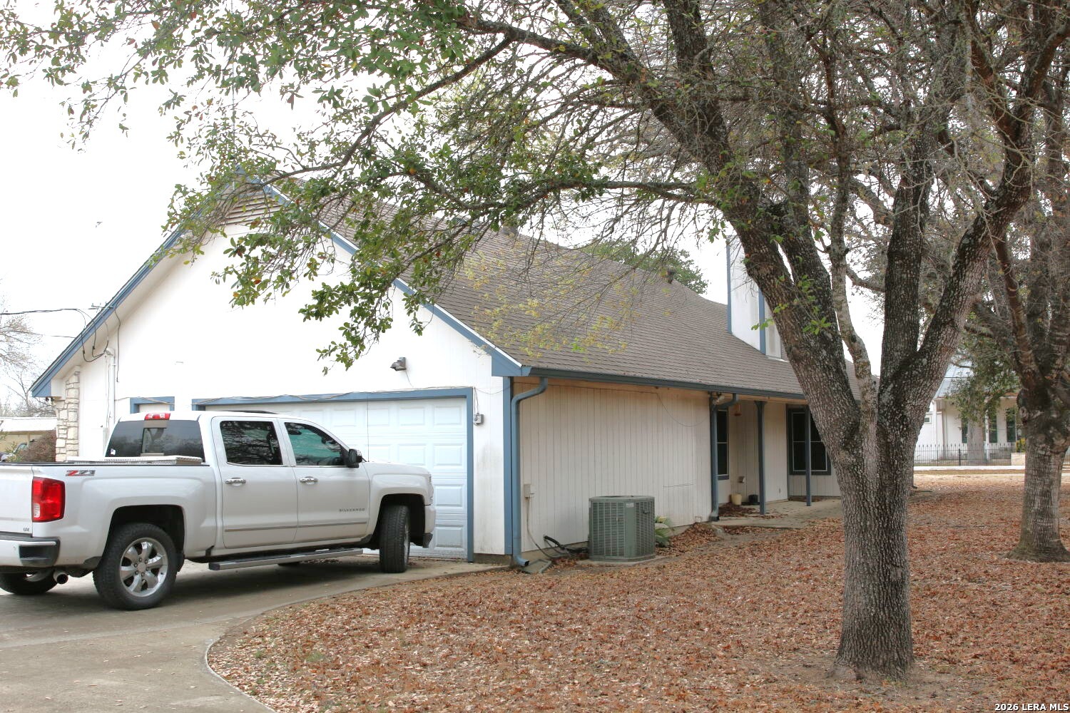 802 Athens Street Castroville, TX 78009 - Photo 5 of 44 a house view with a outdoor space
