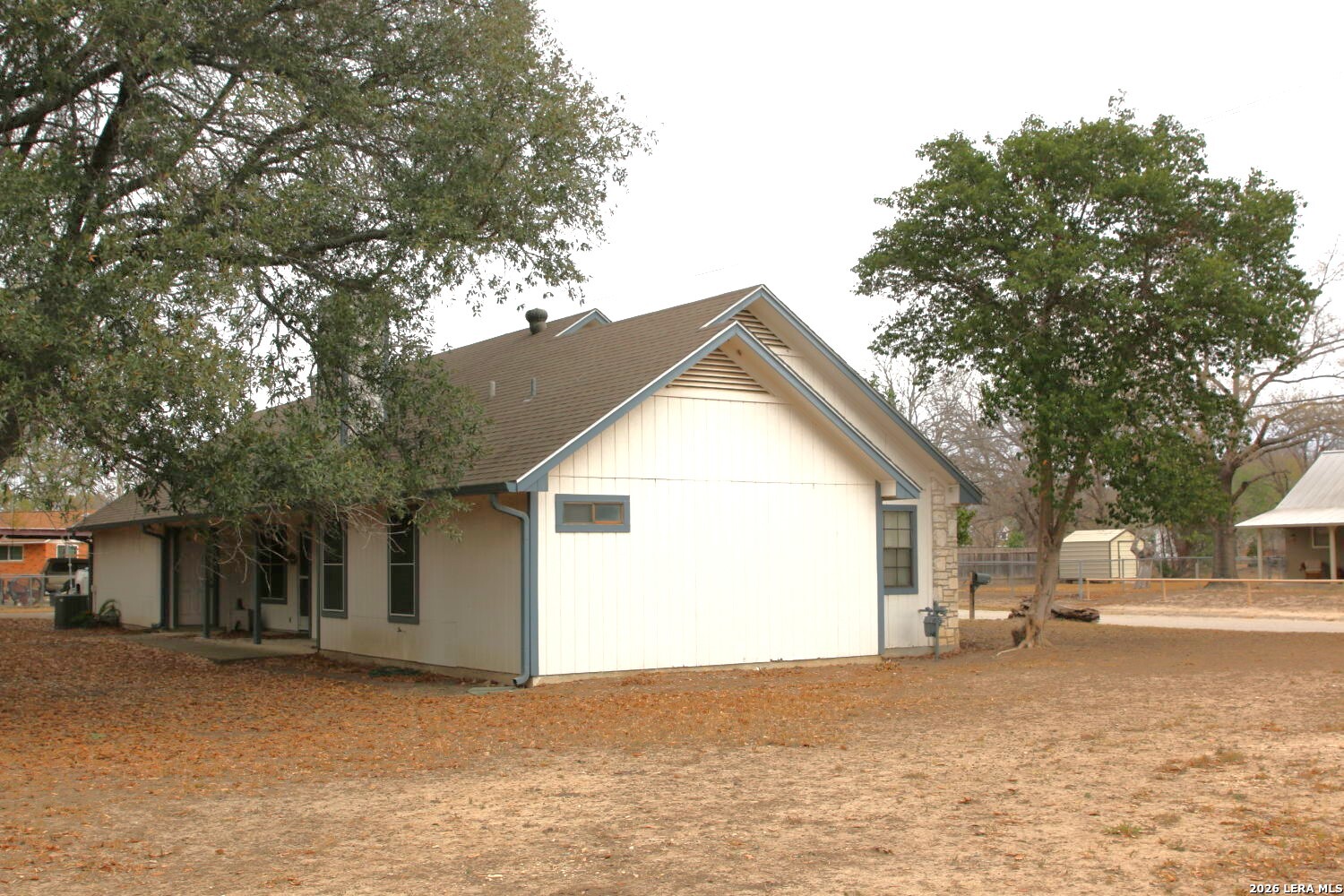802 Athens Street Castroville, TX 78009 - Photo 8 of 44 a view of a house with a yard