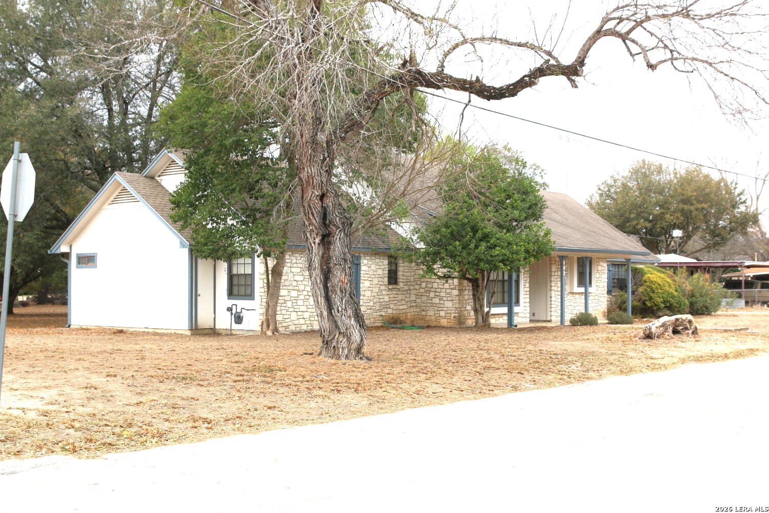 802 Athens Street Castroville, TX 78009 - Photo 10 of 44 a view of a house with snow on the background