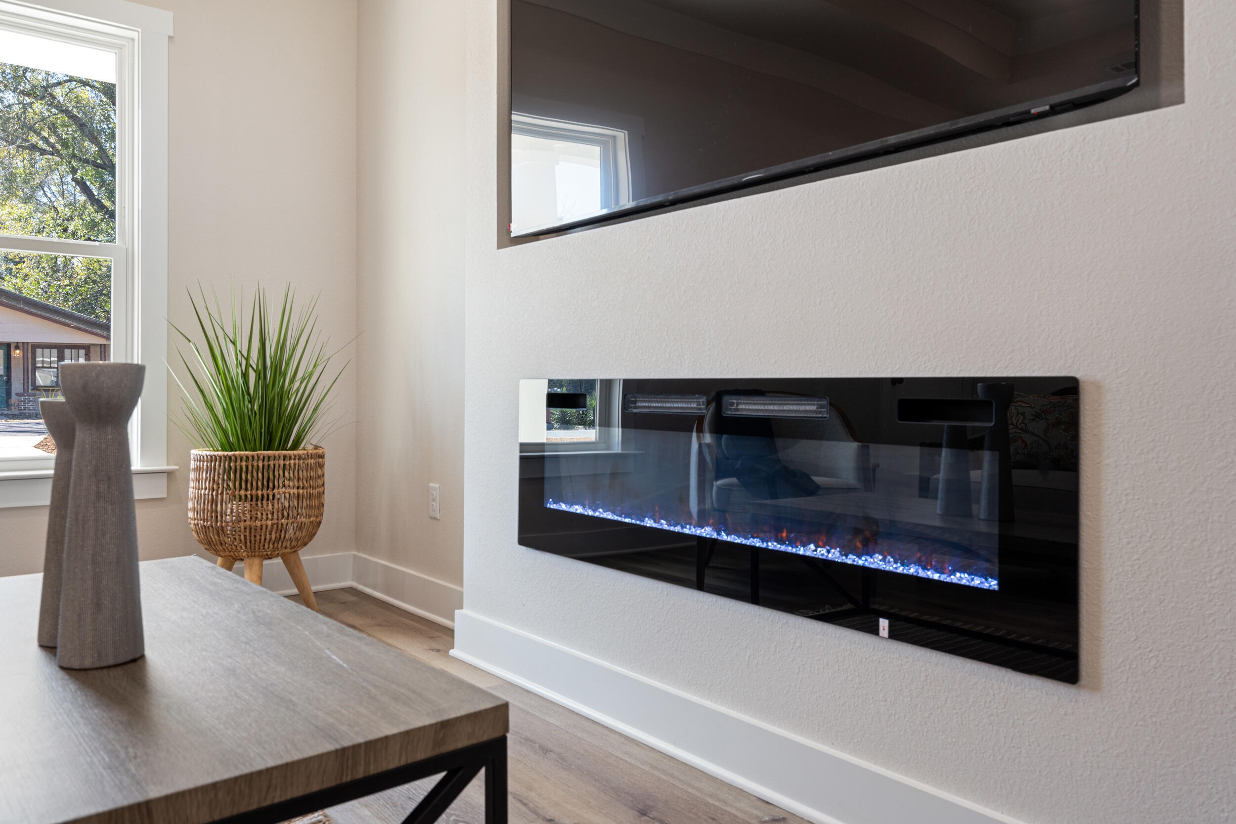 873 Brett Street South Crestview, FL 32539 - Photo 14 of 50 a living room with furniture and a fireplace