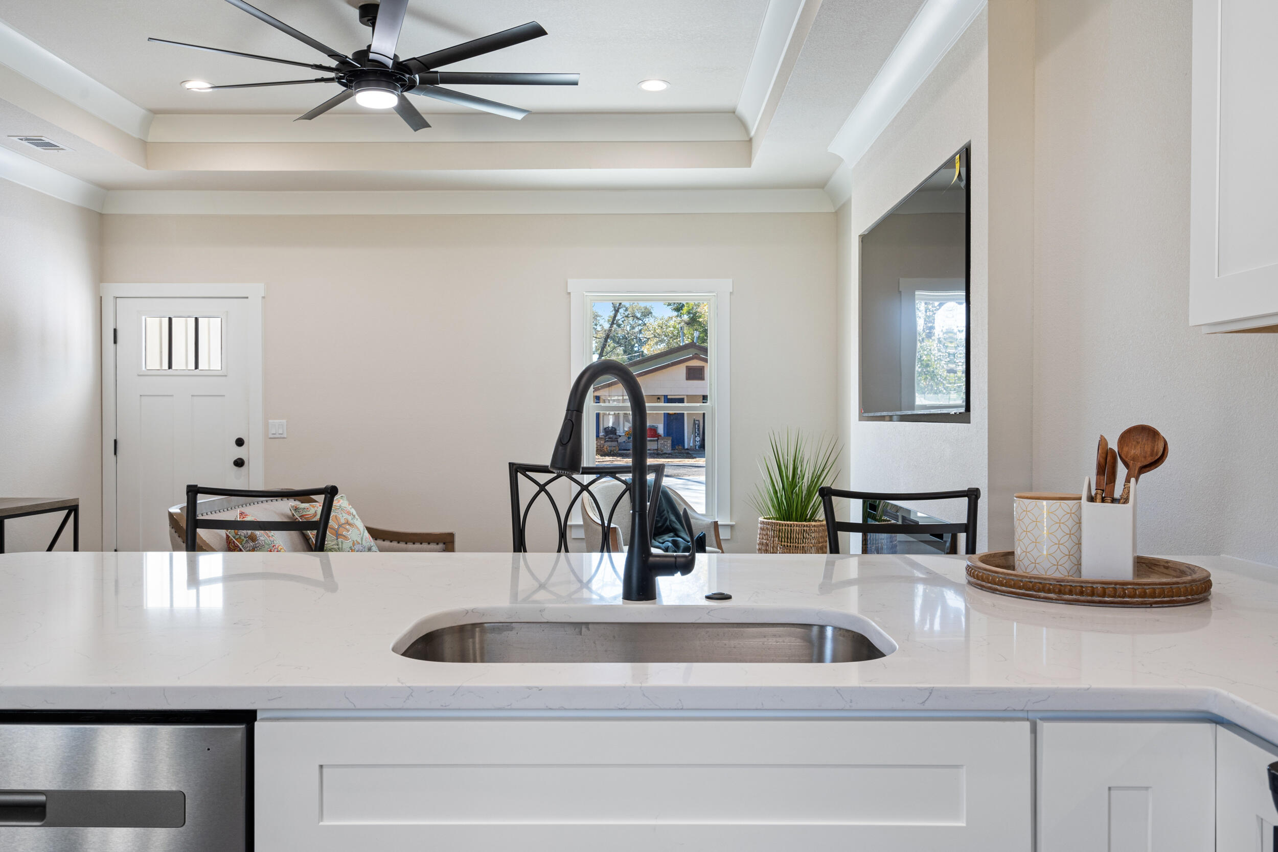 873 Brett Street South Crestview, FL 32539 - Photo 16 of 50 a kitchen with a sink and a mirror