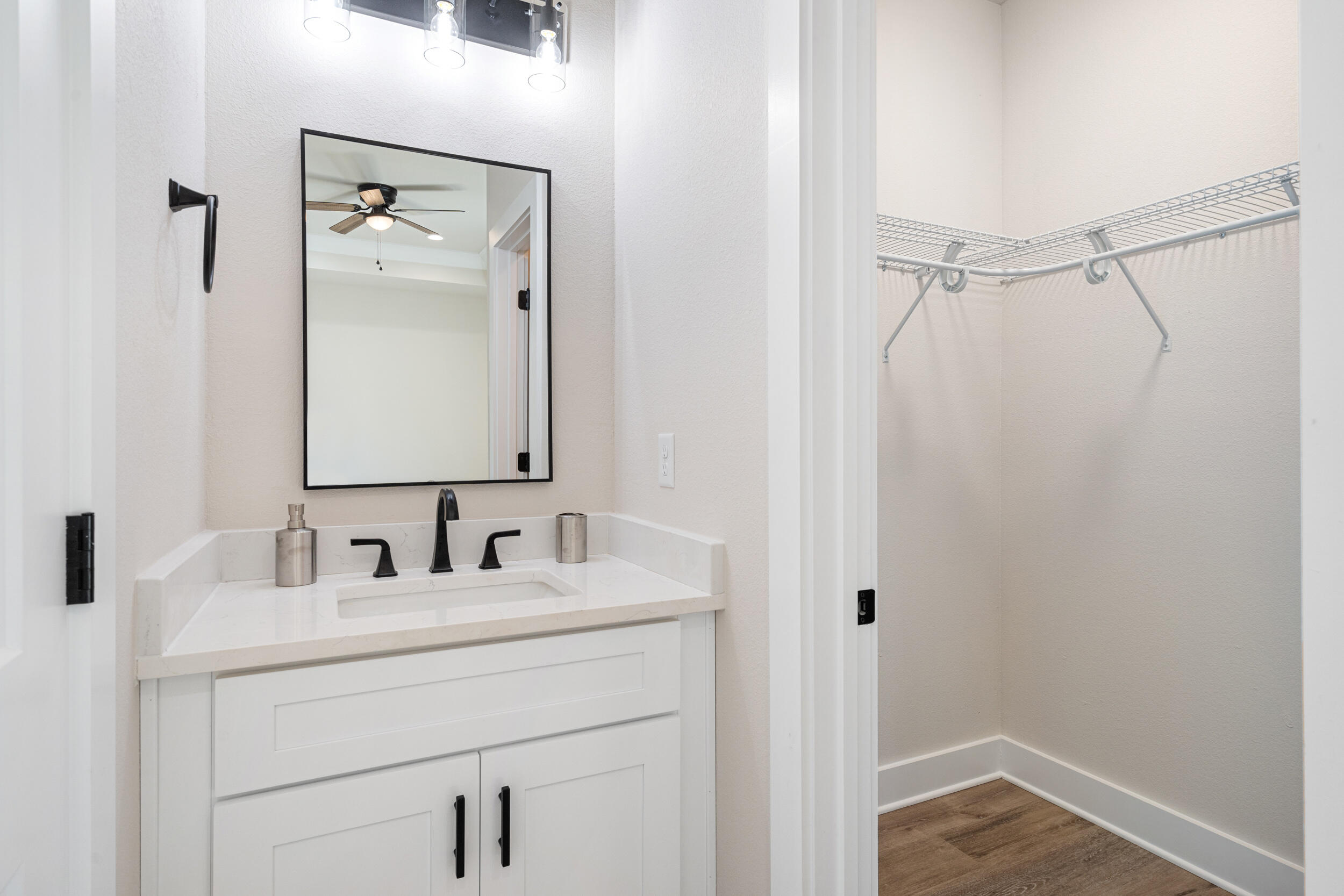 873 Brett Street South Crestview, FL 32539 - Photo 35 of 50 a bathroom with a sink and a mirror