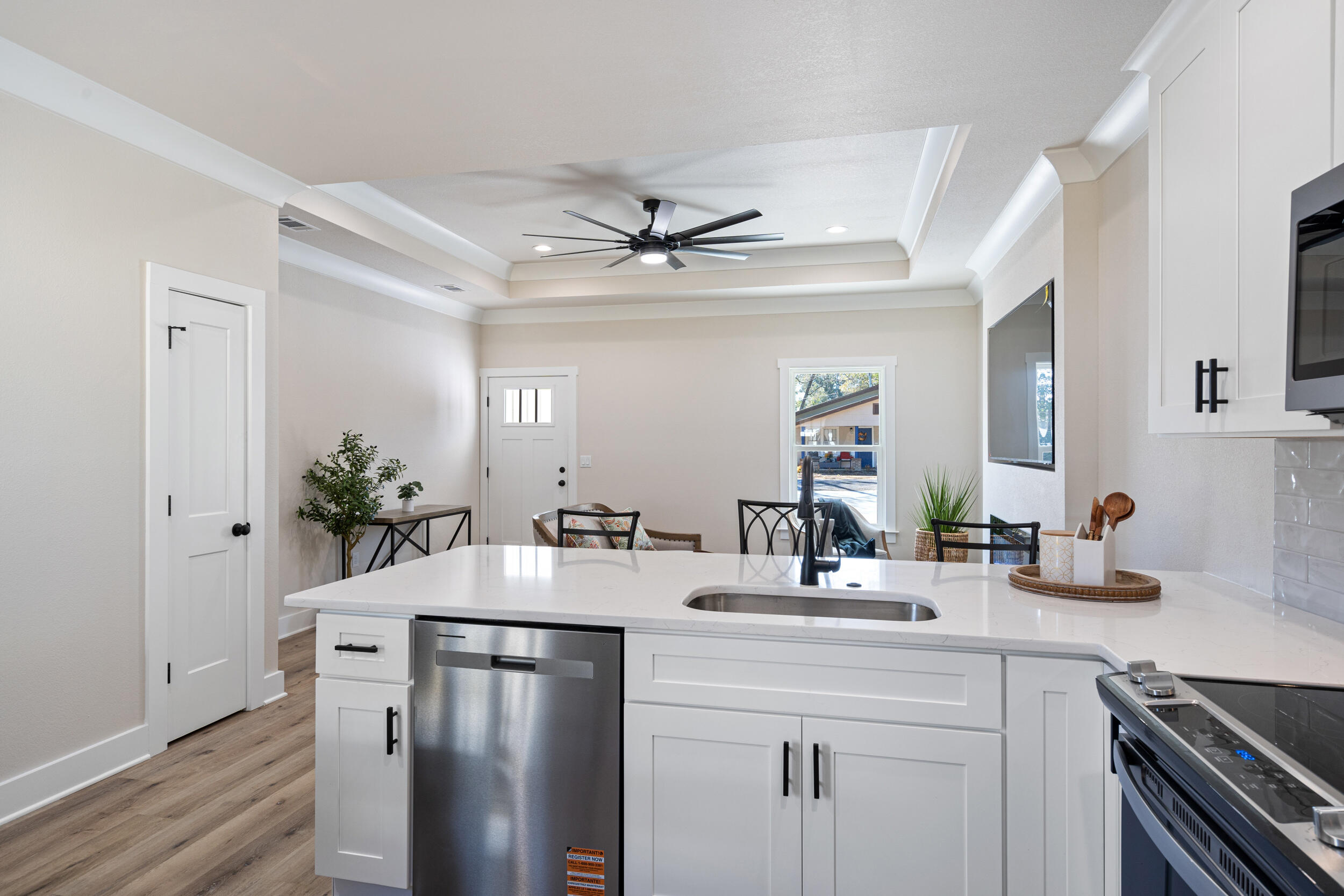 873 Brett Street South Crestview, FL 32539 - Photo 4 of 50 a kitchen with stainless steel appliances a sink and a refrigerator