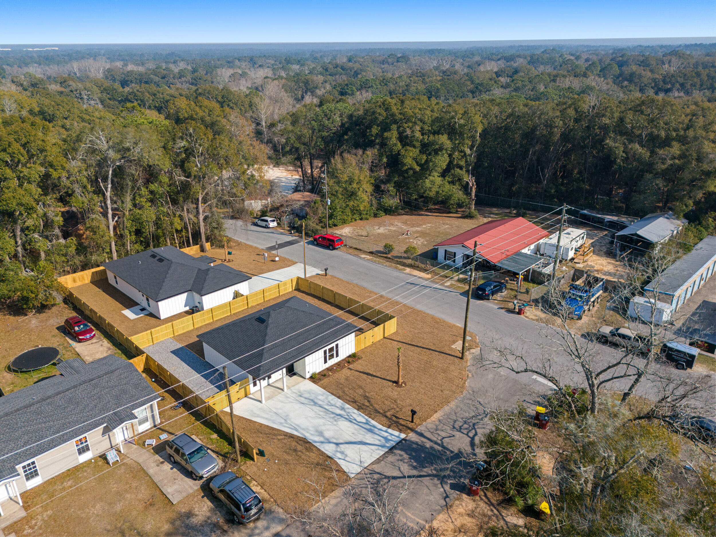 873 Brett Street South Crestview, FL 32539 - Photo 49 of 50 an aerial view of a house with a swimming pool