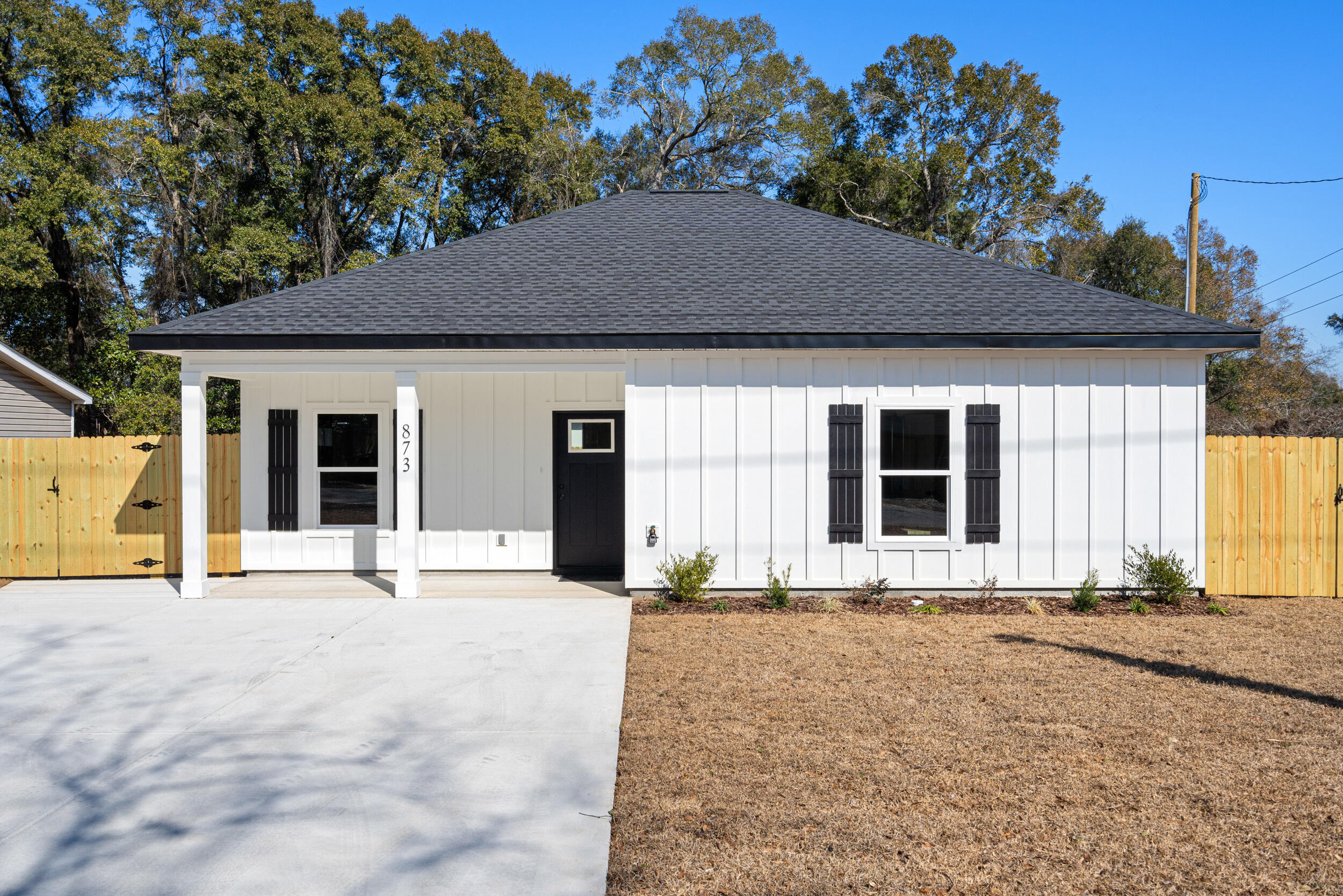 873 Brett Street South Crestview, FL 32539 - Photo 5 of 50 a front view of a house with a outdoor space