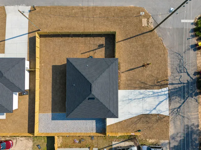 a kitchen with a sink and a mirror