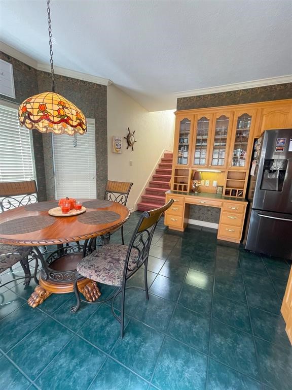 1655 Wooten Road Beaumont, TX 77707 - Photo 11 of 46 a room with lots of tables and chairs