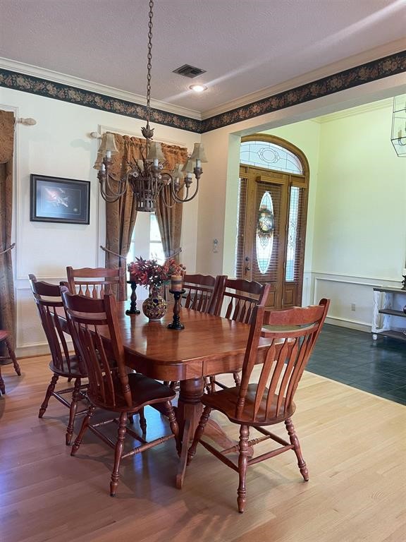 1655 Wooten Road Beaumont, TX 77707 - Photo 16 of 46 a view of a dining room with furniture and window